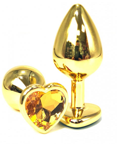 Золотистая анальная пробка с оранжевым кристаллом-сердцем - 6 см.